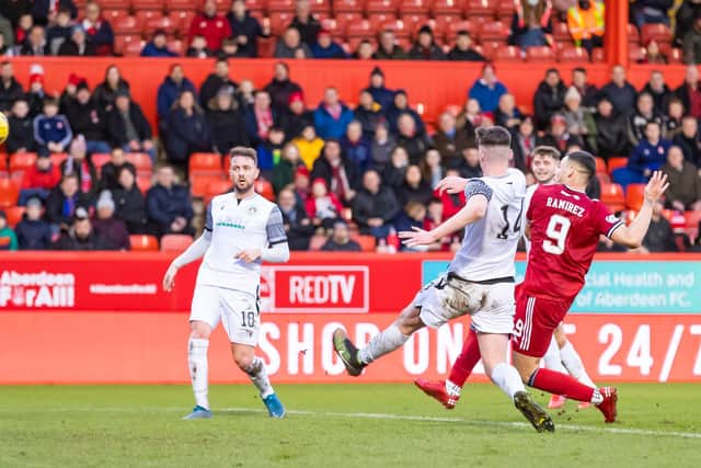 Christian Ramirez scores to make it 2-0 to Aberdeen.