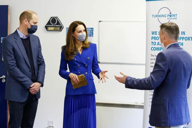 The Duke and Duchess of Cambridge with Neil Richardson (right), CEO of Turning Point Scotland, during a visit to their social care centre in Coatbridge, North Lanarkshire.(Credit: Phil Noble/PA Wire)