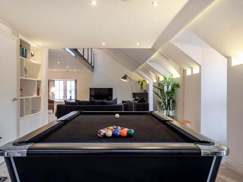 Mezzanine level has plenty of room for a pool table