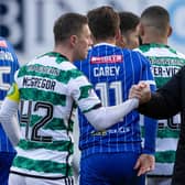 Celtic manager Brendan Rodgers congratulates Callum McGregor at full-time after the win over St Johnstone.