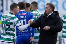 Celtic manager Brendan Rodgers congratulates Callum McGregor at full-time after the win over St Johnstone.