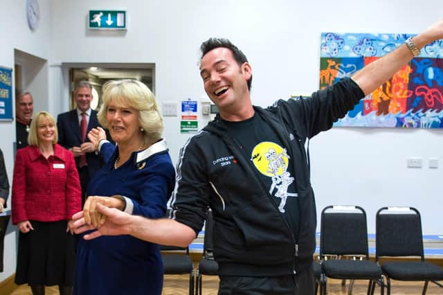 President of the Royal Osteoporosis Society Camilla, Duchess of Cornwall, and  Strictly Come Dancing judge Craig Revel Horwood dance the cha-cha-cha. Dancing is one way to help keep bones healthy (Picture: Arthur Edwards/WPA pool/Getty Images)