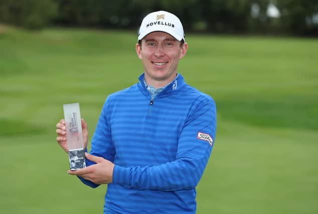 Euan Walker shows off the trophy after winning the British Challenge presented by Modest! Golf Management at St. Mellion Estate in Cornwall. Picture: Luke Walker/Getty Images.