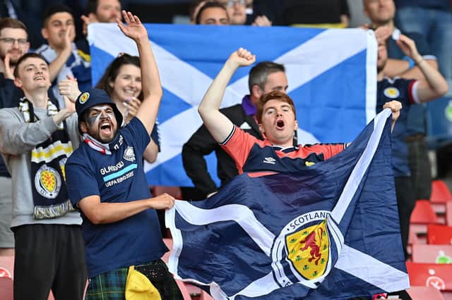 Scotland supporters cheered on their team at Euro 2020, but the Tartan Army will not be allowed to travel to Denmark and Austria for next month's World Cup qualifiers. (Photo by PAUL ELLIS/POOL/AFP via Getty Images)