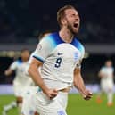 See Naples and make like you're half dead. Harry Kane, back on his feet, celebrates a famous victory