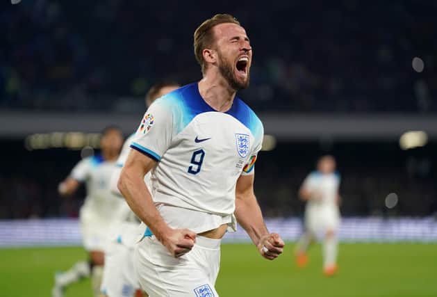 See Naples and make like you're half dead. Harry Kane, back on his feet, celebrates a famous victory