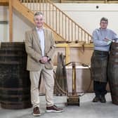 Adam Hardie, business development partner and head of food and drink at Johnston Carmicahel; Gary Drummond, founder of the Trossachs Cooperage; and Alan Wright at the Trossachs Cooperage in Callander.