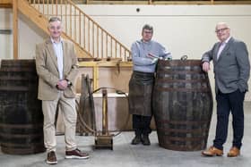 Adam Hardie, business development partner and head of food and drink at Johnston Carmicahel; Gary Drummond, founder of the Trossachs Cooperage; and Alan Wright at the Trossachs Cooperage in Callander.