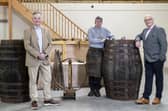 Adam Hardie, business development partner and head of food and drink at Johnston Carmicahel; Gary Drummond, founder of the Trossachs Cooperage; and Alan Wright at the Trossachs Cooperage in Callander.