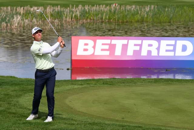 Calum Hill chips on to the 18th green during the first round of The Betfred British Masters hosted by Danny Willett at The Belfry. Picture: Richard Heathcote/Getty Images.