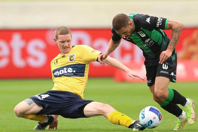Kye Rowles in defensive action for Central Coast Mariners. (Photo by Robert Cianflone/Getty Images)