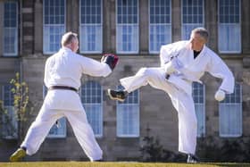 The Lib Dem leader taking part in a karate lesson with Robert Steggles at the Meadows.  Pic: Jane Barlow