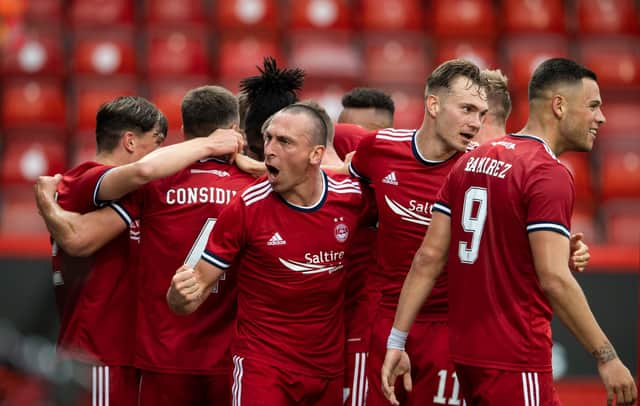 Aberdeen captain Scott Brown leads the celebrations against BK Hacken.