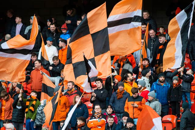 Two Dundee United fans have raised nearly £10,000 to help pay for the cub's legal fees. Picture: SNS