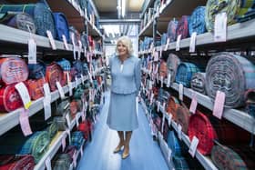 Queen Camilla during a visit to Lochcarron of Scotland at the Waverley textile mill in Selkirk. Picture: Jane Barlow/PA Wire