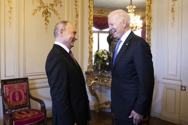 Joe Biden met Vladimir Putin in June 2021 in Geneva (Picture: Peter Klaunzer/pool/Keystone via Getty Images)