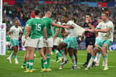 Damian Willemse of South Africa is held back by team-mate Pieter-Steph Du Toit during the match against Ireland.