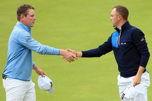 Bob MacIntyre and Justin Thomas shake hands after playing together in the third round of the 148th Open Championship at Royal Portrush in 2019. Picture: Andrew Redington/Getty Images.