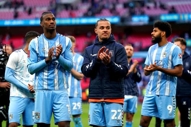 Coventry City's Haji Wright (left), Joel Latibeaudiere and Ellis Simms applaud the fans at the end of the semi-final at Wembley.