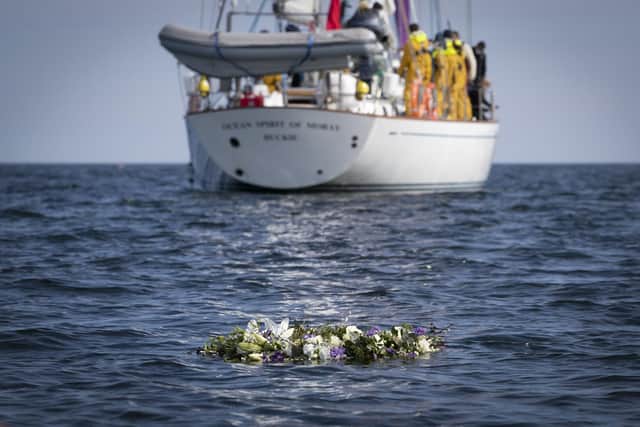 Gordonstoun School's training boat Ocean Spirit of Moray sails on after laying of the wreath.