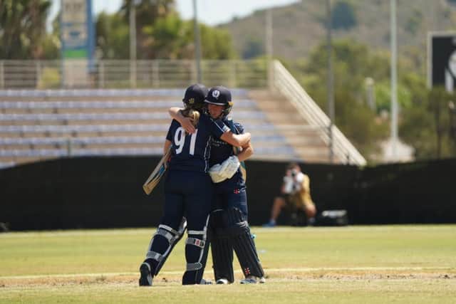 Aitken Drummond and McGill celebrate Scotland's win. (Picture: CricketScotland)