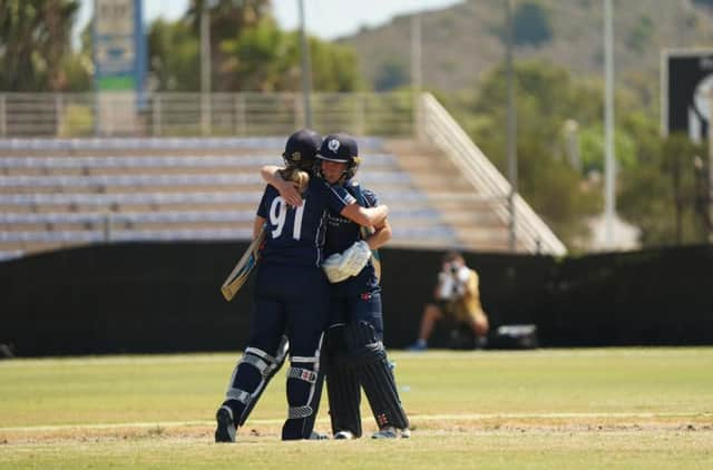 Aitken Drummond and McGill celebrate Scotland's win. (Picture: CricketScotland)