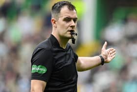 Referee Don Robertson was called out by Hearts manager Robbe Neilson and his defender Toby Sibbick for missing a Callum McGregor foul on the Tynecastle player in the lead-up to Celtic's equalising first goal. (Photo by Rob Casey / SNS Group)
