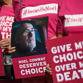 Supporters of the campaign group Dignity in Dying protest in support of Noel Conway, 67, who is terminally ill with motor neurone disease and wants laws banned assisted dying to be changed (Picture: Jack Taylor/Getty Images)