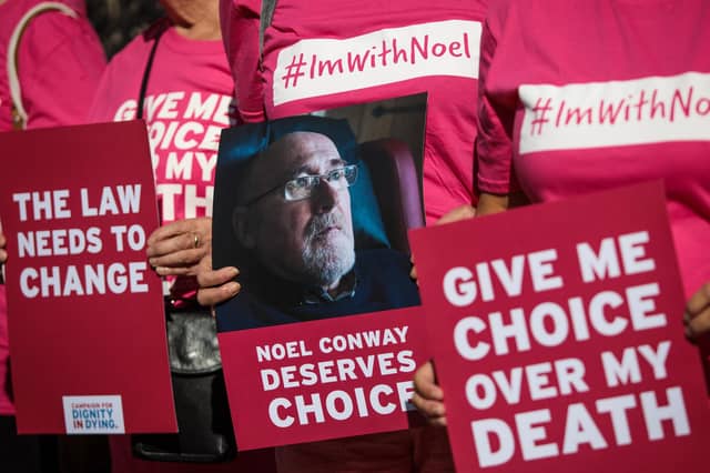 Supporters of the campaign group Dignity in Dying protest in support of Noel Conway, 67, who is terminally ill with motor neurone disease and wants laws banned assisted dying to be changed (Picture: Jack Taylor/Getty Images)