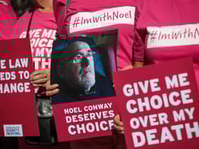 Supporters of the campaign group Dignity in Dying protest in support of Noel Conway, 67, who is terminally ill with motor neurone disease and wants laws banned assisted dying to be changed (Picture: Jack Taylor/Getty Images)