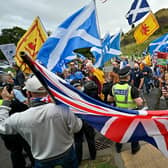 Unionist supporters confront Scottish pro-independence marchers