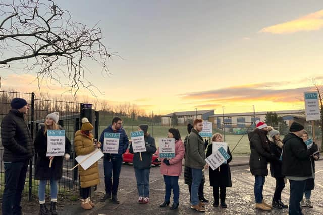 Teachers from the Scottish Secondary Teachers' Association union (SSTA) on the picket line at Smithycroft Secondary School in Glasgow, as schools across Scotland are hit by teachers' strikes with members of two trade unions taking action on Wednesday and Thursday. Picture date: Wednesday December 7, 2022.