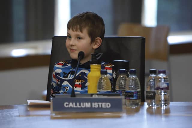 Callum Isted, aged seven, presents his petition