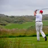 Donald Trump plays at his inaugural Scottish golf course in Balmedie, Aberdeenshire. Picture: Andy Buchanan/AFP/Getty