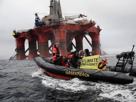 A Greenpeace boat alongside the BP-chartered Transocean 'The Paul B Loyd Jr' rig en route to the Vorlich field in the North Sea. Picture: Greenpeace