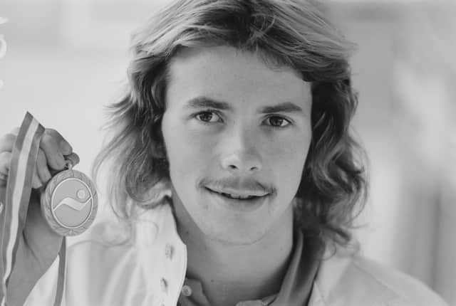 Mine at last ... with the greatest prize in swimming, for which he didn't have to shave his cherished locks