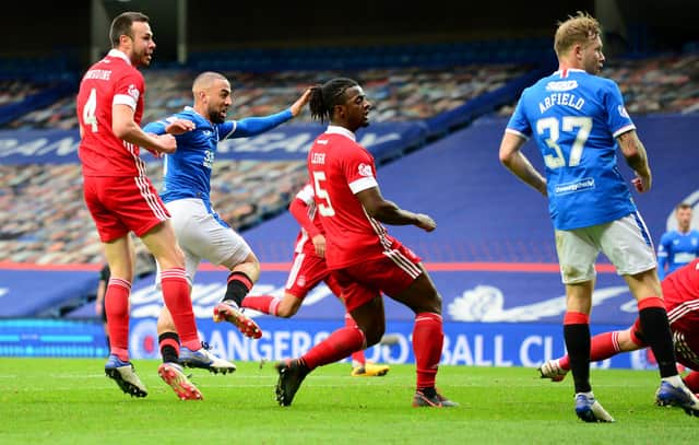 Kemar Roofe scores Rangers' second goal in their 4-0 win against Aberdeen in the Premiership at Ibrox on Sunday. (Photo by Mark Runnacles/Getty Images)