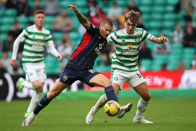 Harry Clarke holds off Celtic's Adam Montgomery during a cinch Premiership match between Celtic and Ross County at Celtic Park earlier this season. Photo by Alan Harvey / SNS Group