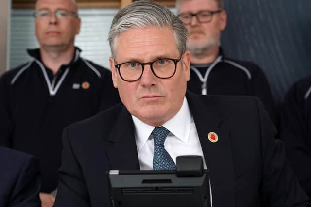 Prime Minister Sir Keir Starmer speaks on the phone to US President Donald Trump during a visit to the West Midlands. Photo: Alberto Pezzali/PA Wire