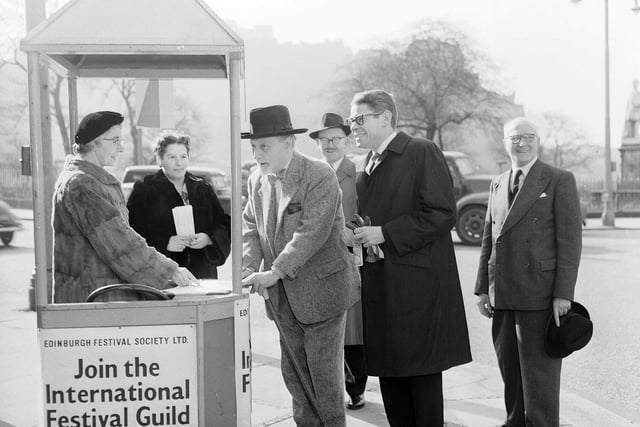 Stanley Baxter and Sir Compton MacKenzie join the International Festival Guild at the kiosk beside RSA Galleries in 1961.
