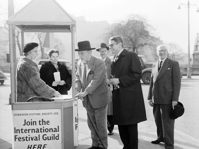 Stanley Baxter and Sir Compton MacKenzie join the International Festival Guild at the kiosk beside RSA Galleries in 1961.
