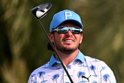 Defending champion Ewen Ferguson watches a tee shot in the first round of the Commercial Bank Qatar Masters. Picture: Picture: Ross Kinnaird/Getty Images.