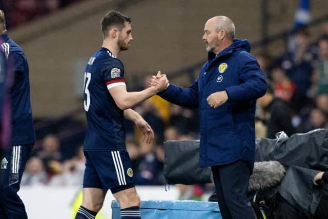 Steve Clarke congratulates goalscorer Anthony Ralston as he is substituted in the second half of Scotland's 2-0 win over Armenia at Hampden. (Photo by Alan Harvey / SNS Group)