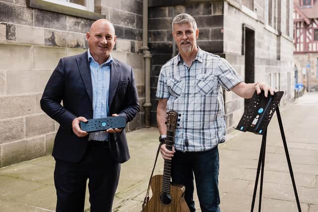 From left: Brian Machray, business development director at Reward Finance Group, with Noisy Clan founder David Law and his Wee Stand product. Picture: Daniel Rannoch/Fern Photography.