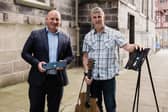 From left: Brian Machray, business development director at Reward Finance Group, with Noisy Clan founder David Law and his Wee Stand product. Picture: Daniel Rannoch/Fern Photography.