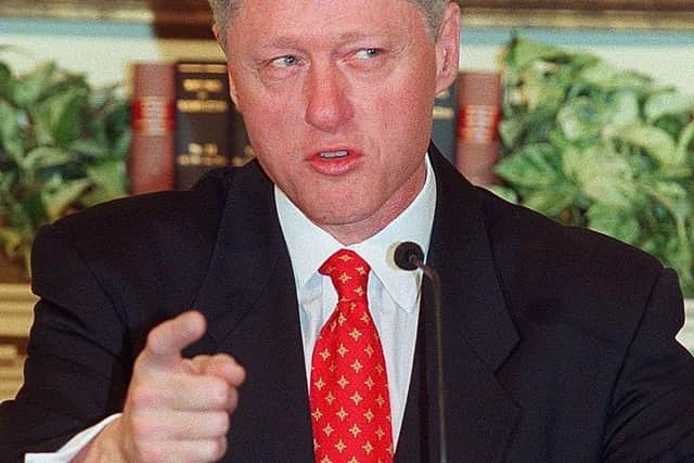 Bill Clinton addresses reporters in January 1998 concerning an alleged affair with former White House intern Monica Lewinsky. 'I did not have sexual relations with that woman,' he insisted (Picture: Joyce Naltchayan/AFP/Getty Images)