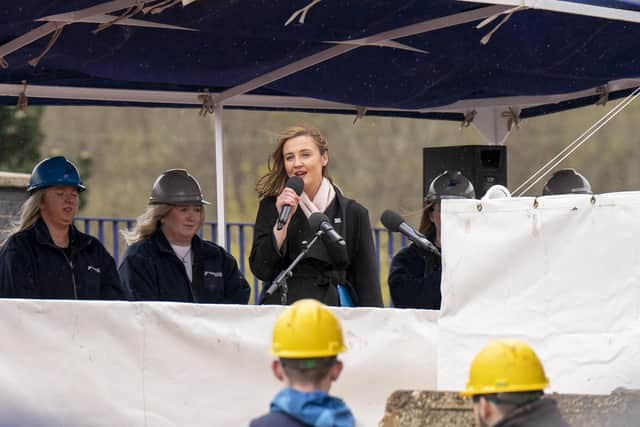 Wellbeing Economy Secretary Mairi McAllan speaks at the Glen Rosa launch at Ferguson Marine accompanied by female apprentices from the yard. (Photo by Jane Barlow/PA Wire)