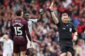 Hearts defender Michael Steinwender is shown a straight red card by referee John Beaton during the Scottish Cup semi-final defeat to Aberdeen at Hampden. (Photo by Alan Harvey / SNS Group)
