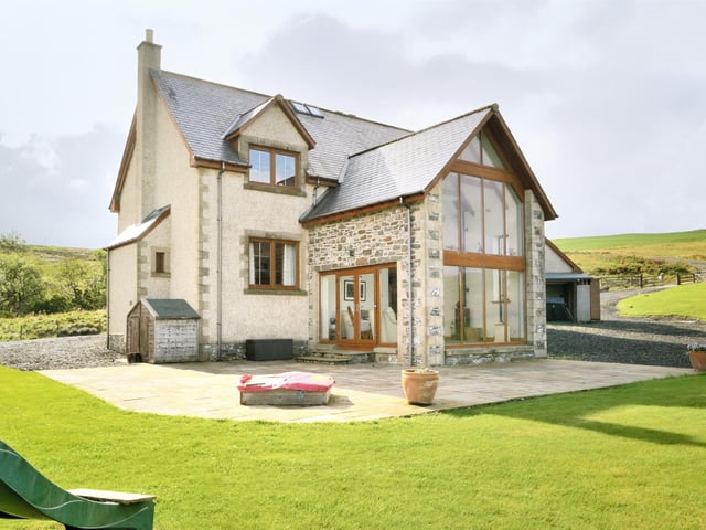 What is it? A detached four-bedroom home with enviable countryside views, which are magnificently framed by full-height windows in the property’s vaulted sitting room. Well suited for those seeking the rural life.