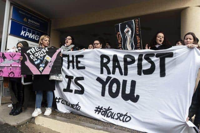 Women's rights activists stage a protest during the trial at the Famagusta District Court in Paralimni in eastern Cyprus.